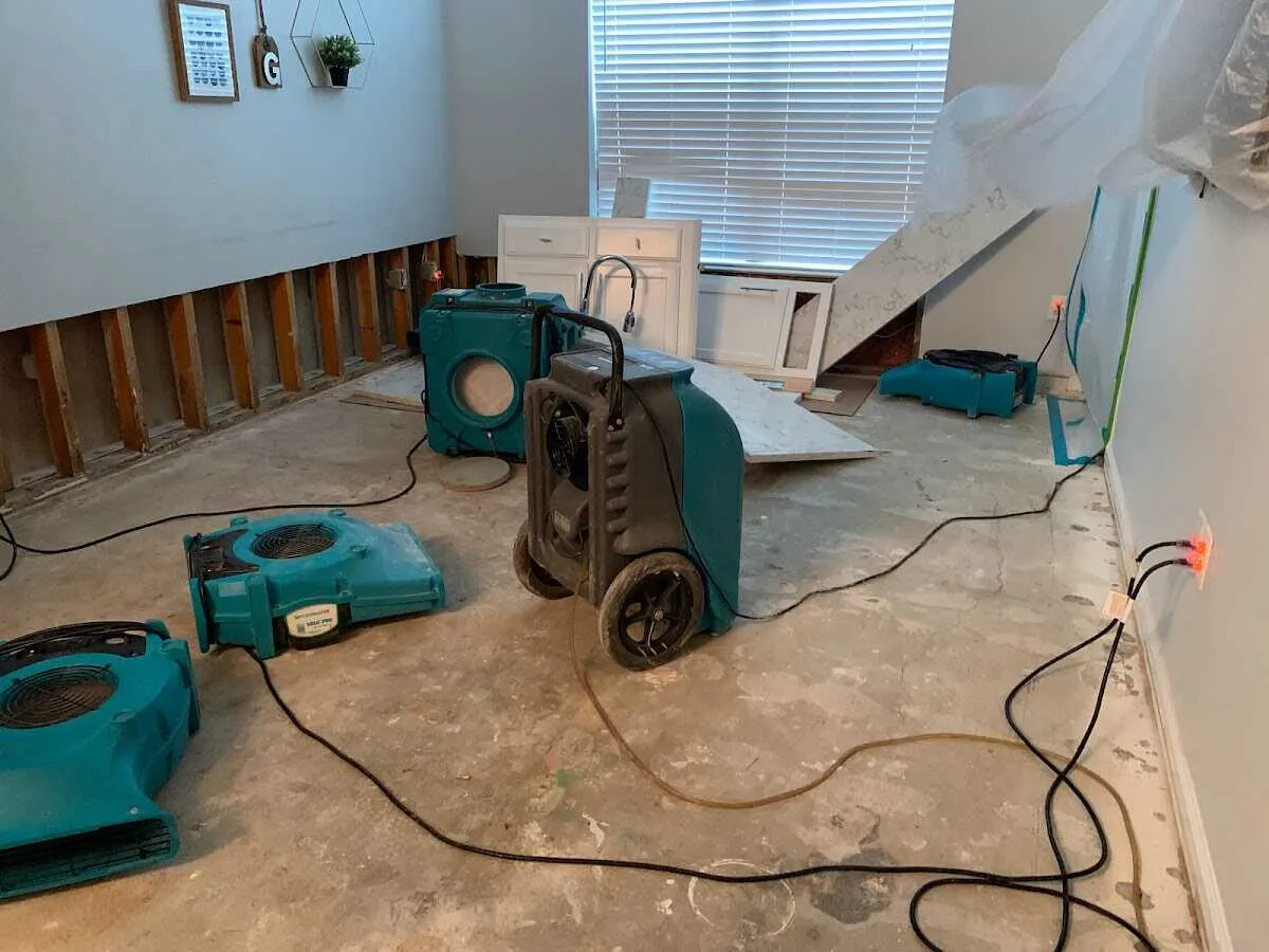 Dehumidifier in flood-cut room for Water Damage Restoration in Arvin